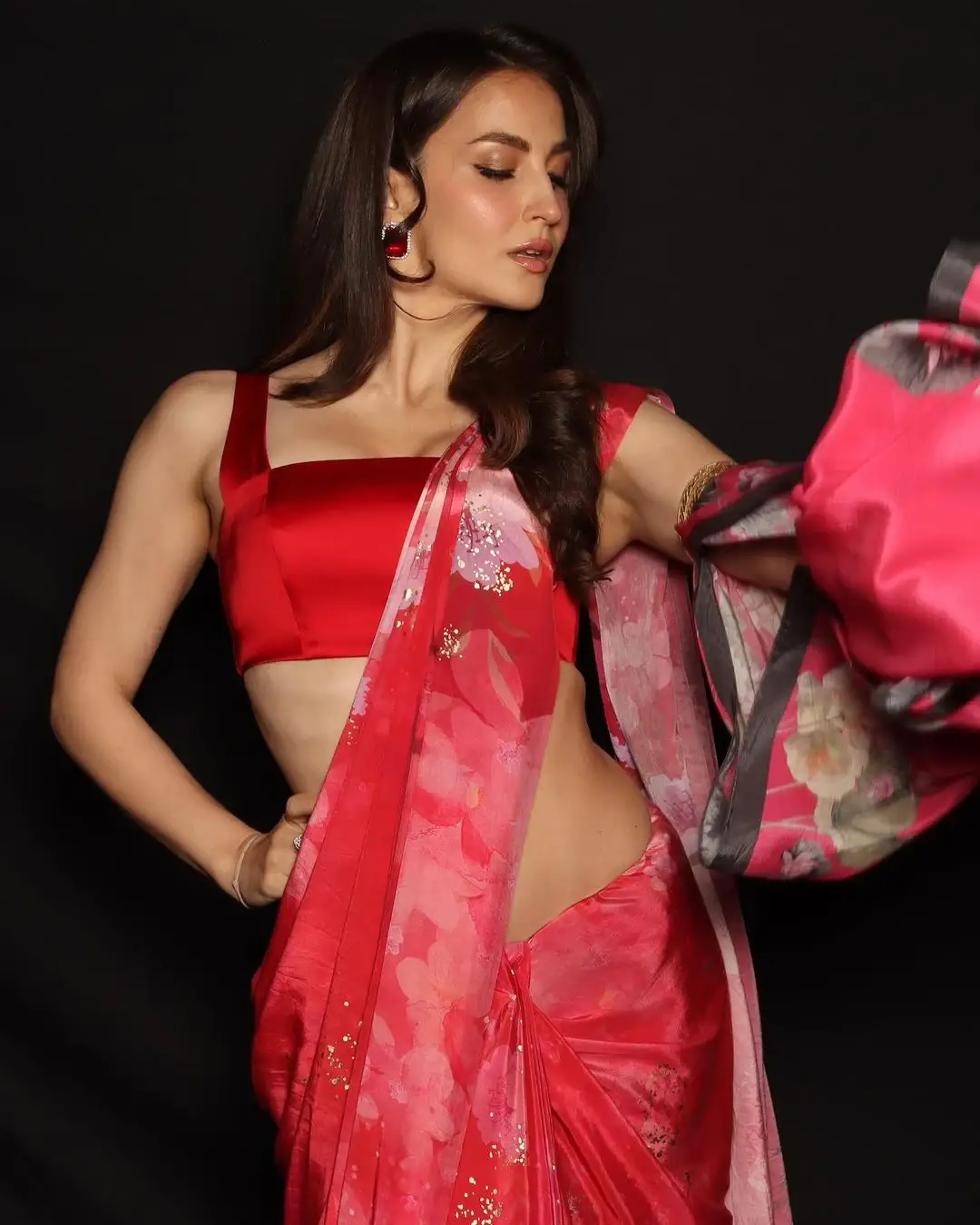 Indian Actress Evelyn Sharma in Red Saree